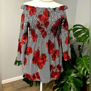 #8)  mileage shoulder off  floral top with stretch chest size medium excellent.